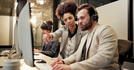 Headset, computer and call center agent with manager in office for feedback on crm or contact us....