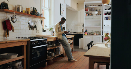 Breakfast, search and black man with phone in kitchen for healthy recipe, digital app and website. Nutrition, morning meal and person with online cookbook, tutorial and ingredient list for wellness
