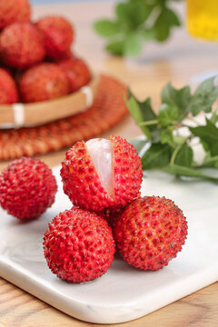 Fresh Lychees from Lingshan Zengcheng Maoming - Tropical Fruit with Peeled White Flesh and Nucleus Seed on White Plate