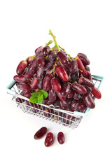Fresh Red Grapes in Shopping Cart Basket - Healthy Food Shopping Concept