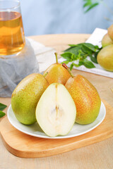 Fresh Fragrant Pears from Xinjiang China - Sweet Crisp Fruit Section Cut on Wooden Board