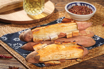 Traditional Roasted Sweet Potatoes and Chestnuts on Slate Board with Chinese Spices