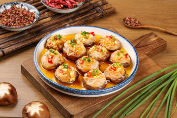 Homemade Teppanyaki Stuffed Shiitake Mushrooms with Noodles in Traditional Asian Dish Setting