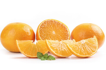 Fresh Oranges Whole and Sliced with Mint on White Background
