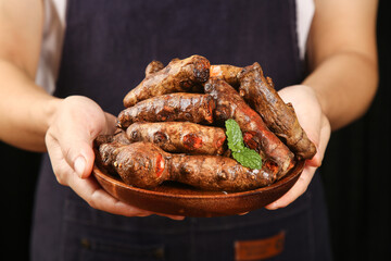 Fresh Sichuan Turmeric Roots in Wooden Bowl - Traditional Chinese Seasoning Spice Ingredient