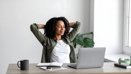 Happy woman relaxing with hands behind head while sitting at desk, home office lifestyle and stress free work concept