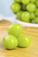 Fresh Green Seedless Grapes on Wooden Board - Healthy Organic Fruit
