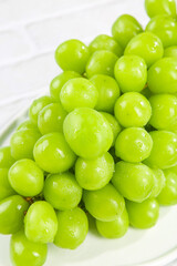 Fresh Green Grapes with Water Droplets in Sunshine - Organic Fruit Harvest