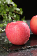 Fresh Red Fuji Apples from Yantai Shandong China on Rustic Wood Surface