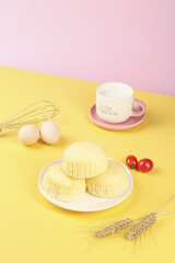 Handmade Steamed Cake Dessert with Coffee Cup on Pastel Yellow Pink Background Food Photography
