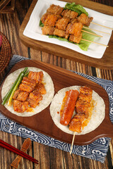 Grilled Meat Skewers and Tacos on Wooden Board - Asian Fusion Street Food