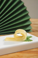 Handmade Sweet Potato Noodles with Fresh Herbs on White Plate - Traditional Asian Food