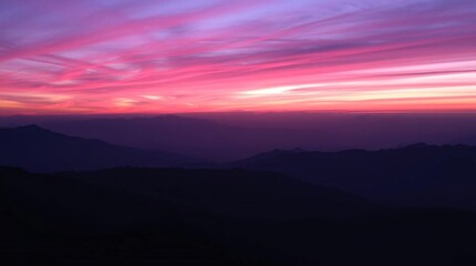 beautiful sunset in the mountains with silhouette of mountain and sky background.