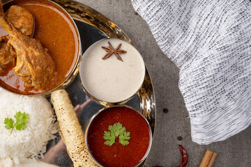 Chicken Kohlapuri is spicy Maharashtrian delicary of tender boneless chicken cooked with aromatic roasted ground spices and coconut. India food.