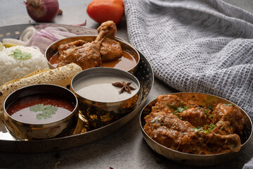 Chicken Kohlapuri is spicy Maharashtrian delicary of tender boneless chicken cooked with aromatic roasted ground spices and coconut. India food.