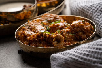 Chicken Kohlapuri is spicy Maharashtrian delicary of tender boneless chicken cooked with aromatic roasted ground spices and coconut. India food.
