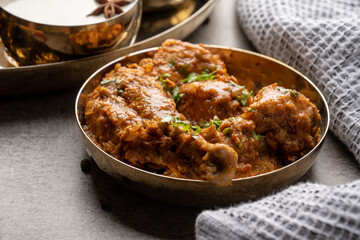 Chicken Kohlapuri is spicy Maharashtrian delicary of tender boneless chicken cooked with aromatic roasted ground spices and coconut. India food.