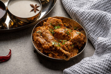 Chicken Kohlapuri is spicy Maharashtrian delicary of tender boneless chicken cooked with aromatic roasted ground spices and coconut. India food.