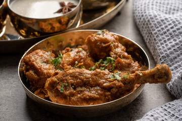 Chicken Kohlapuri is spicy Maharashtrian delicary of tender boneless chicken cooked with aromatic roasted ground spices and coconut. India food.