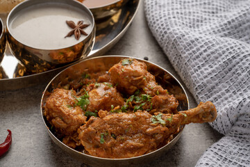 Chicken Kohlapuri is spicy Maharashtrian delicary of tender boneless chicken cooked with aromatic roasted ground spices and coconut. India food.