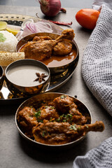 Chicken Kohlapuri is spicy Maharashtrian delicary of tender boneless chicken cooked with aromatic roasted ground spices and coconut. India food.