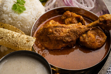 Chicken Kohlapuri is spicy Maharashtrian delicary of tender boneless chicken cooked with aromatic roasted ground spices and coconut. India food.