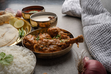 Chicken Kohlapuri is spicy Maharashtrian delicary of tender boneless chicken cooked with aromatic roasted ground spices and coconut. India food.