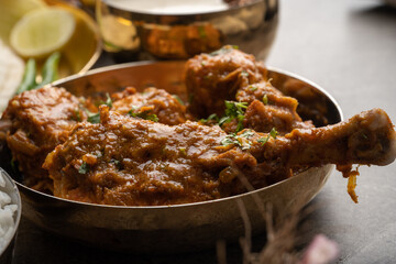 Chicken Kohlapuri is spicy Maharashtrian delicary of tender boneless chicken cooked with aromatic roasted ground spices and coconut. India food.