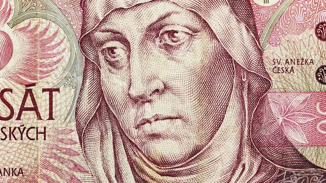 Close pan across Czech 50 korun note showing portrait and Czech Latin script details