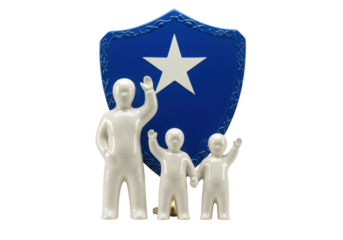 Isolated figurine depicting a family of three standing in front of a blue star badge emblem