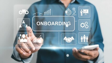 Businessman pressing a glowing button with the word onboarding on a futuristic interface, symbolizing new employee integration and business development