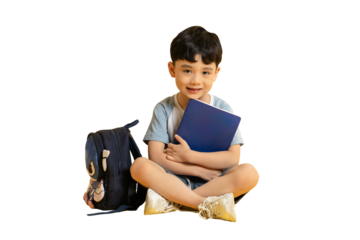 Asian kid A cute child sitting cross-legged, holding a book and smiling with a backpack on PNG