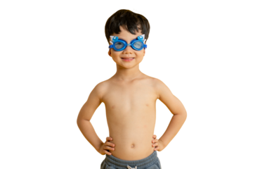 Asian kid A cheerful child wearing swimming goggles and standing with his hands on his hips on PNG