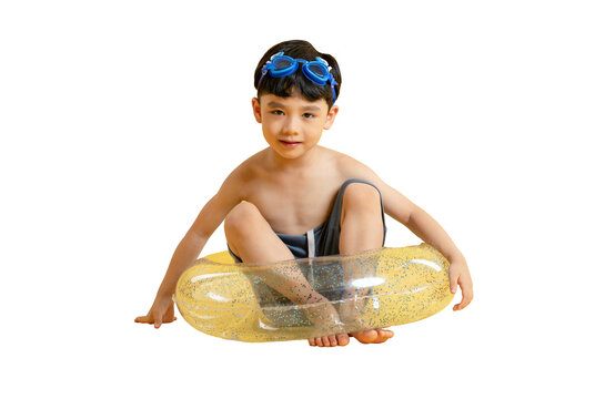 Asian kid A young boy sitting in a yellow inflatable tube, with swimming goggles on. A picture of a happy boy at summer. - Powered by Adobe