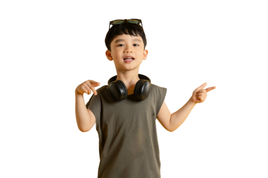 A young Asian boy with a happy expression pointing in different directions and holding a headphone on PNG