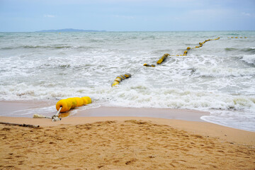 Buoys to keep the water safe for swimmers and to prevent strong waves due to storms