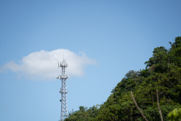 communication tower against a clear blue sky