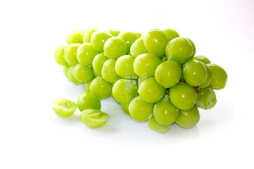 Fresh Bunches of shine muscat grapes green fresh grapes isolated on white background. Japanese grapes ripe juicy grapes.