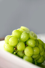Fresh Bunches of shine muscat grapes green fresh grapes isolated on white background. Japanese grapes ripe juicy grapes.