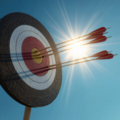 Target bullseye arrow archery gold center red ring white ring sun flare precision hit group