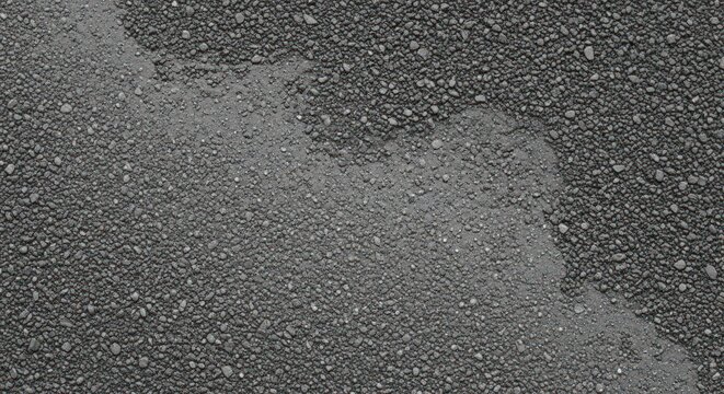 Fresh asphalt surface with patching, road repair and construction