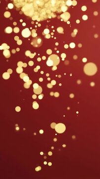 Festliches Gold-Bokeh auf rotem Hintergrund &ndash; Weihnachtslichter und Glanzpunkte in Bewegung