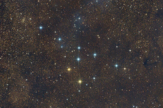 Collinder 399 Coathanger star cluster in night sky with brilliant stars