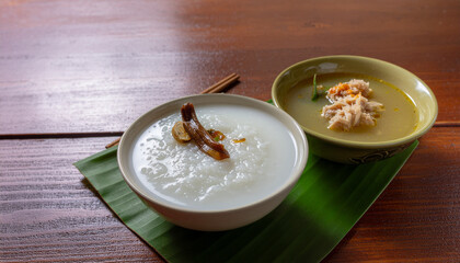 White Rice Porridge With Dried Fish and Crab Soup for Traditional Asian Breakfast and Comfort Food