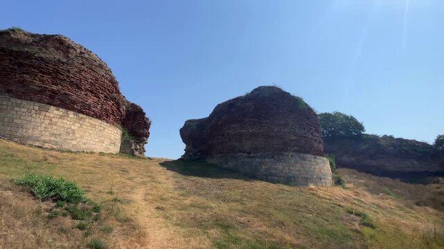 Ruins of the fortress walls of ancient Gabala. Two large brick structures are the remains of the southern entrance to the ancient city of Chukhur Gabala. A trip to Azerbaijan