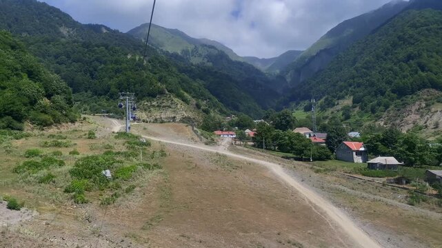 Tufandag ski resort in summer. Aerial view from the cable car in Gabala to the peaks of the mountains and beautiful landscapes of the Caucasus, Azerbaijan.