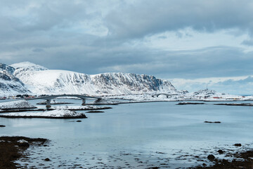 Snowy Bridge and Mountain Landscape