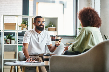 Engaging conversation during a job interview in a cozy modern office setting
