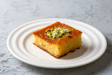 Revani - sweet semolina cake with pistachio, traditional turkish dessert