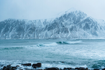 Snow-Covered Mountain by Cold Sea